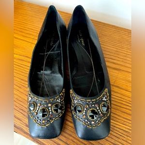 Kate Spade embellished leather flats.